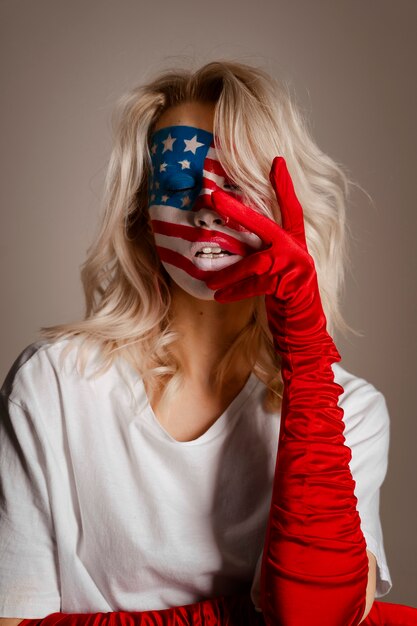 Front view woman posing with usa makeup