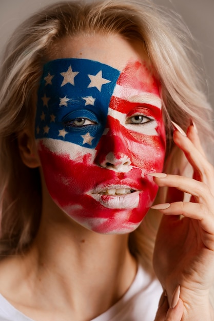 Front view woman posing with usa makeup