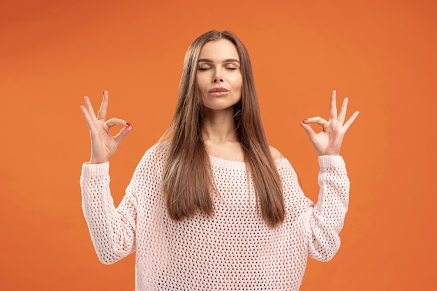 Free photo front view of woman posing zen