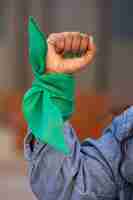 Free photo front view woman protesting outdoors