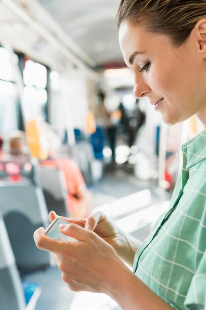 Front view of woman in public transportation