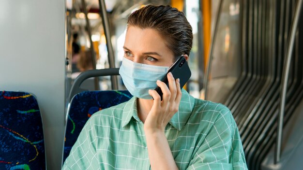 Front view of woman in public transportation