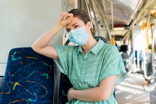 Front view of woman in public transportation