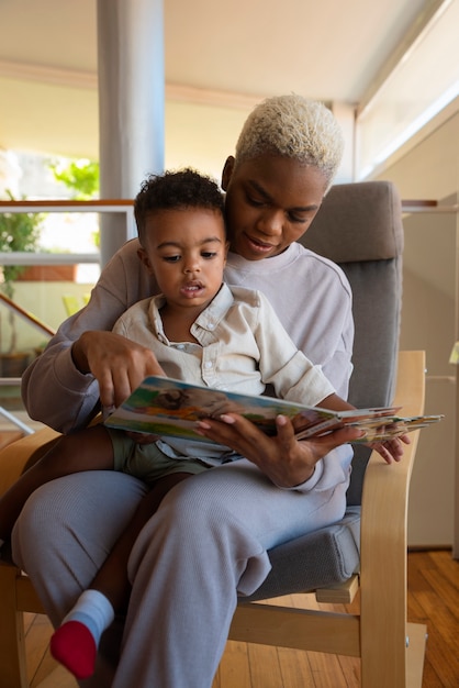 Front view woman reading to kid