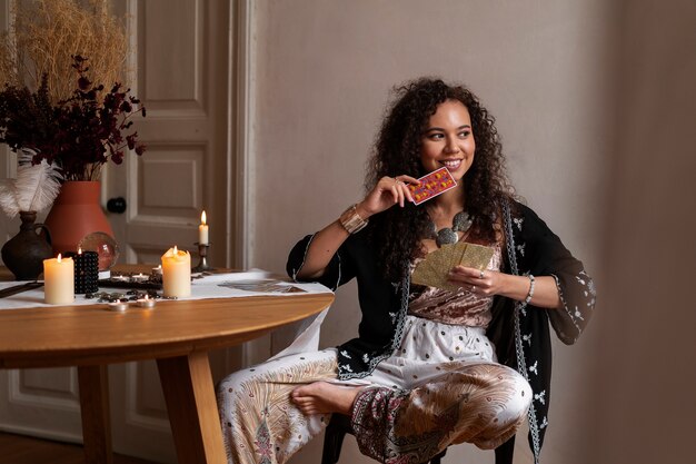 Front view woman reading tarot