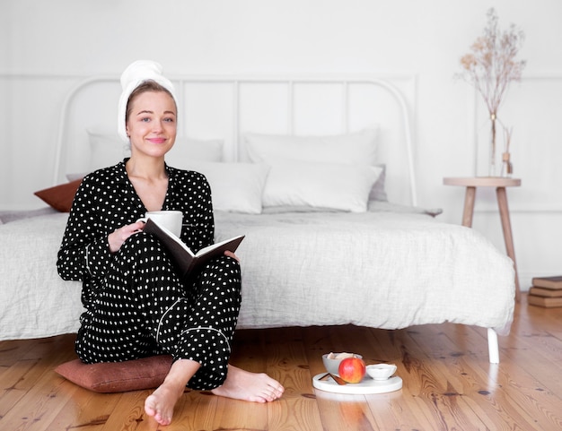 Free photo front view of woman reading