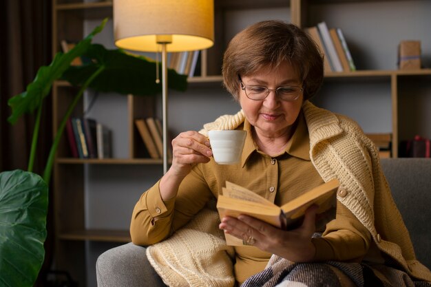 Front view woman sitting at home