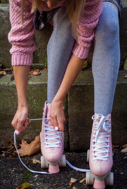 Front view of woman in socks and roller skates