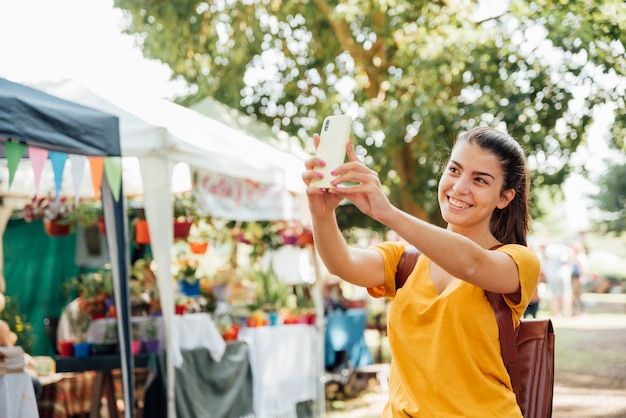 Front view of woman taking a selfie