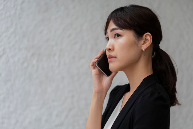 Front view of woman talking on phone