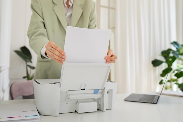 Front view woman using office printer