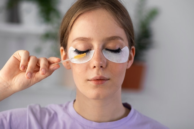 Front view woman wearing eye patches