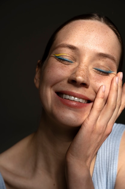 Front view woman wearing  makeup with thick eyebrows