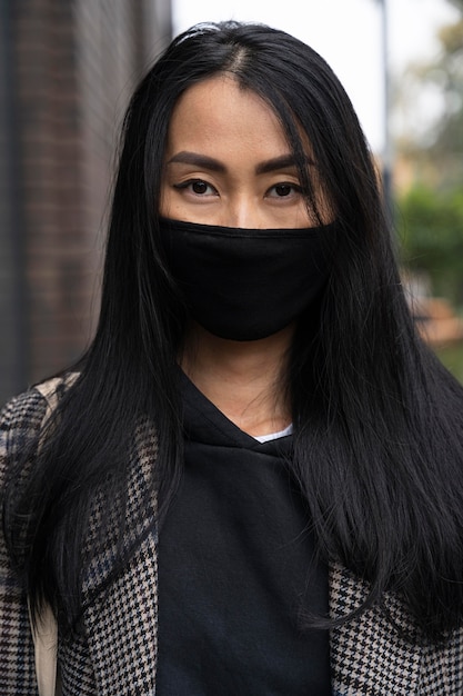 Front view woman wearing mask