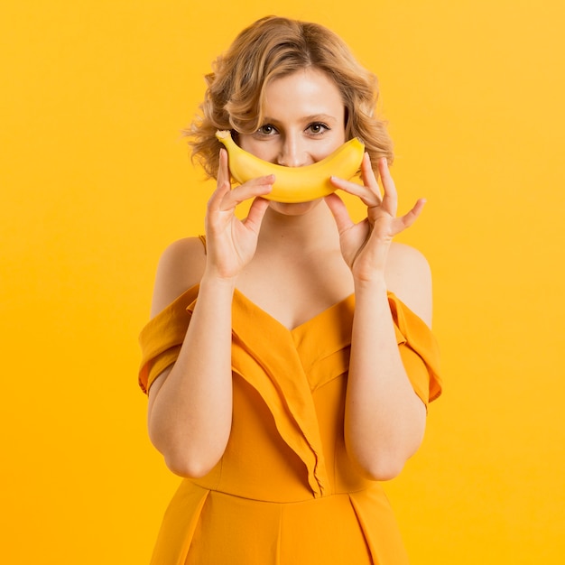 Front view woman with banana