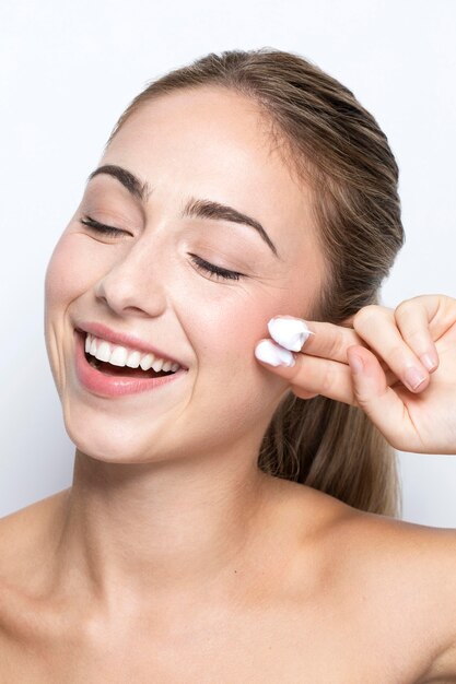 Front view of woman with beauty product concept