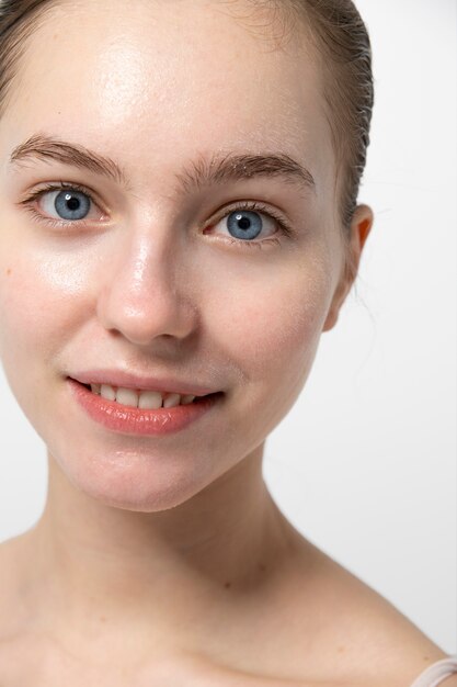 Front view woman with blue eyes posing