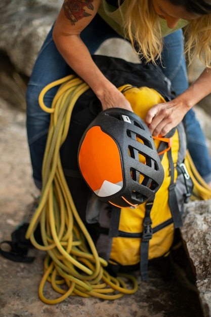 Free photo front view woman with climbing  equipment