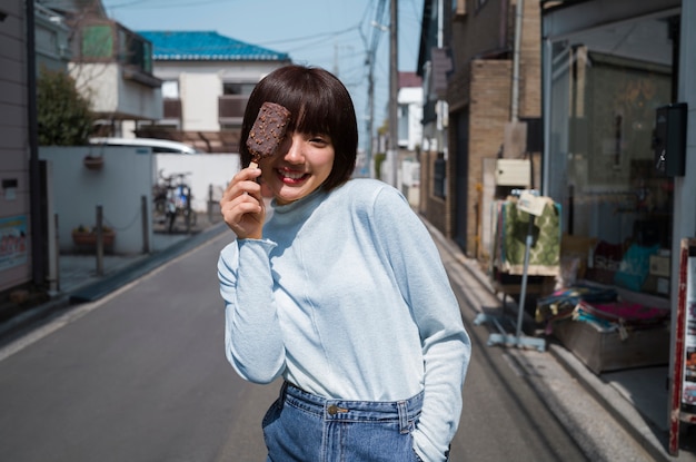 Free photo front view woman with delicious ice cream