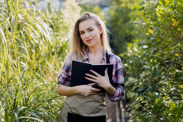 Front view woman with foliage background