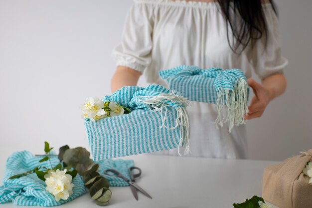 front view woman with  furoshiki package
