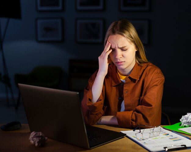 Front view of woman with headache