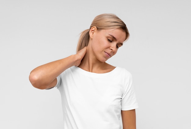 Front view of woman with neck pain