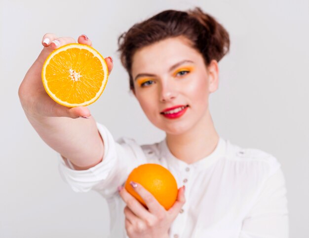 Front view of woman with orange