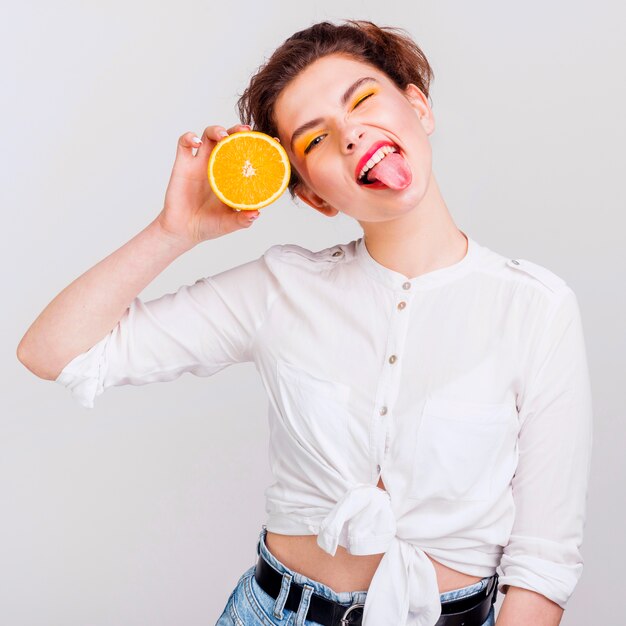 Front view of woman with orange