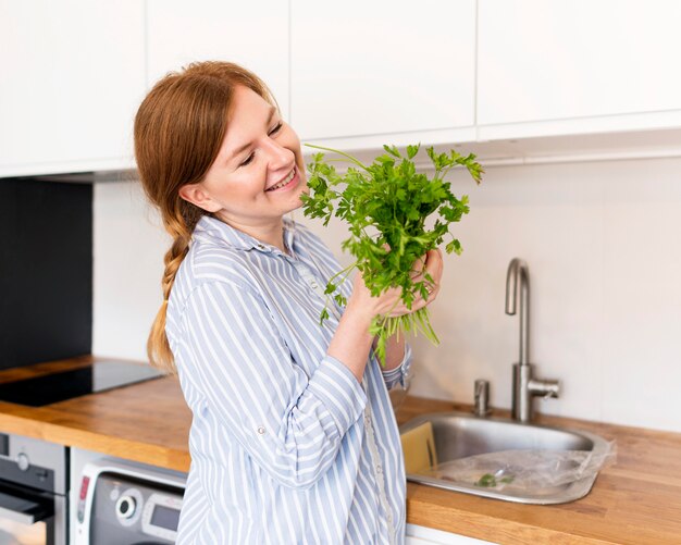 front view of woman with parsley