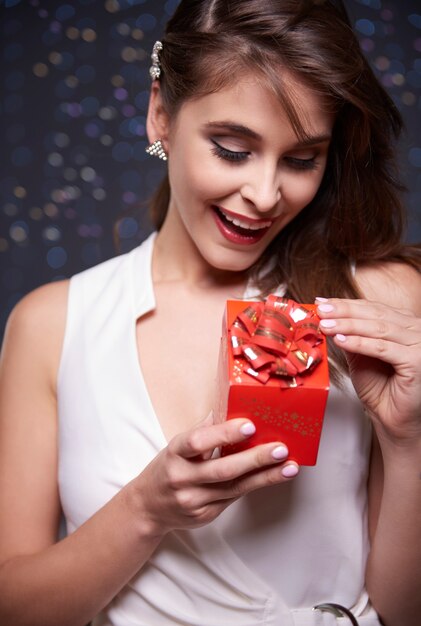 Front view of woman with present