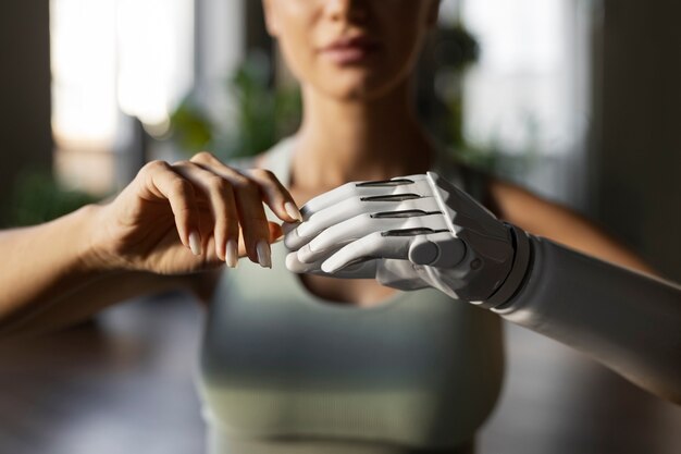 Front view woman with prosthetic arm