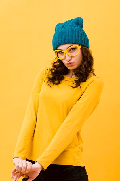 Front view of woman with yellow glasses