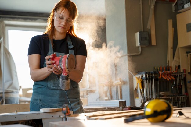 Front view woman working with goggles