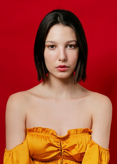 Front view of woman in yellow top