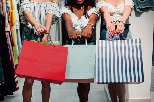 Front view women with shopping bags