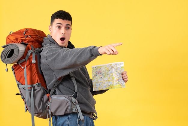 Front view wondered traveler man with backpack holding map