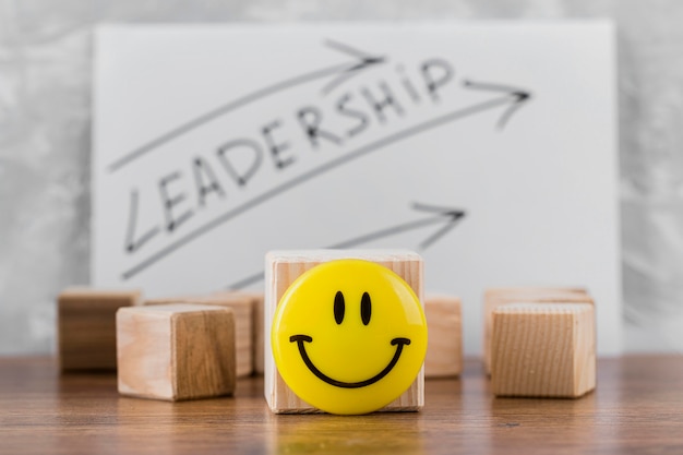 Front view of wooden blocks with leadership