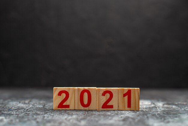 Front view writing on dark table photo color new year