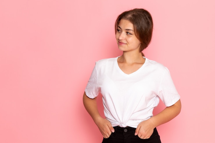Free Photo a front view young beautiful female in white shirt posing with delighted expression