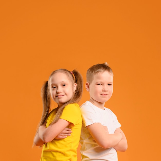 Front view young boy and girl with copy space