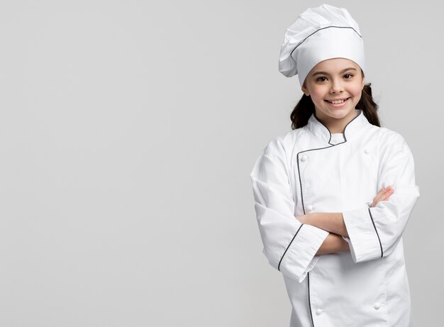 Front view young chef smiling with copy space