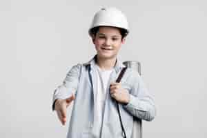 Free photo front view young engineer holding hand
