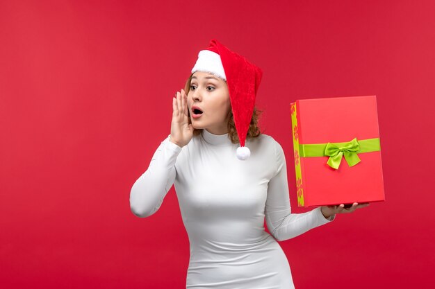 Front view of young female calling someone on red