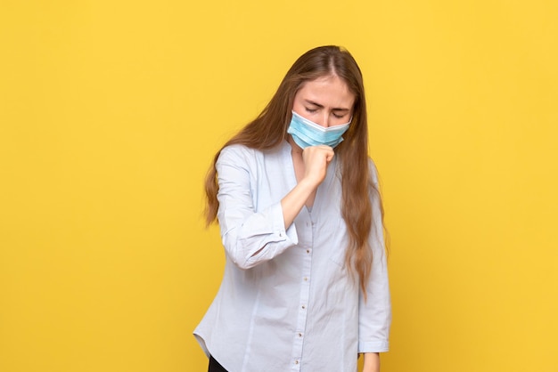 Free photo front view of young female coughing