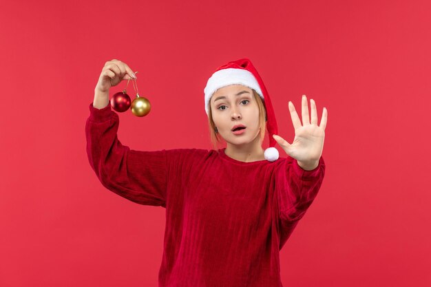 Front view young female counting showing number, holiday christmas emotion