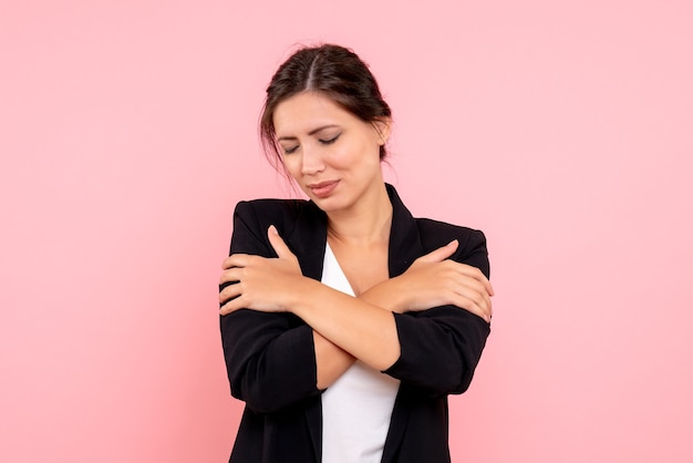 Free photo front view young female in dark jacket on pink background