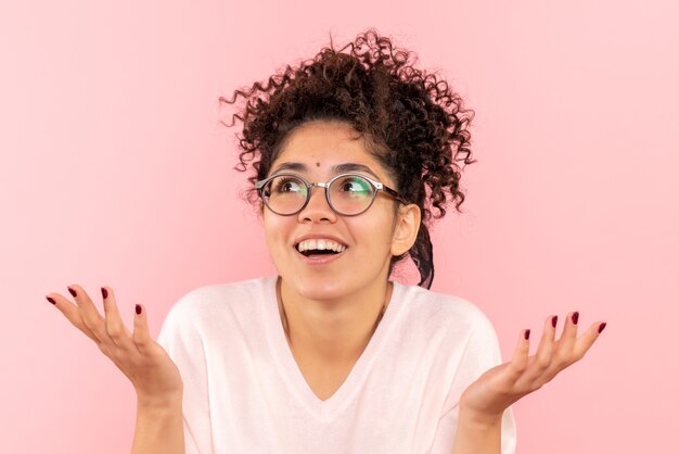 Free photo front view of young female excited on pink