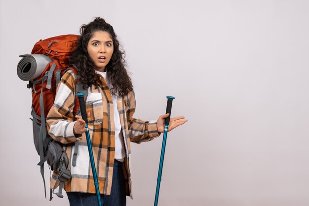 Front view young female going in hiking on white background campus forest nature air mountain height