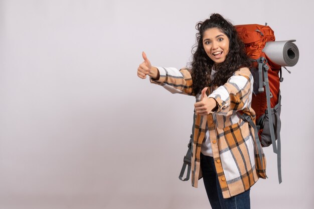 Front view young female going in hiking with backpack on white background forest trip vacation mountain air tourist